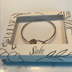 Sseko Rose Gold Brave Bracelet Africa charm